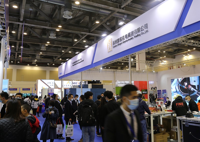 2027年苏州国际机床展-CMES华机展CMES参展商与海外采购商展台洽谈现场